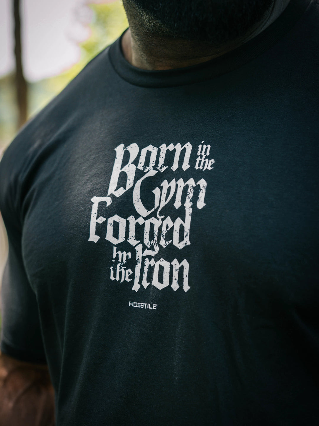 Bodybuilder Samson Dauda wearing the Forged Workout T-Shirt#color_black