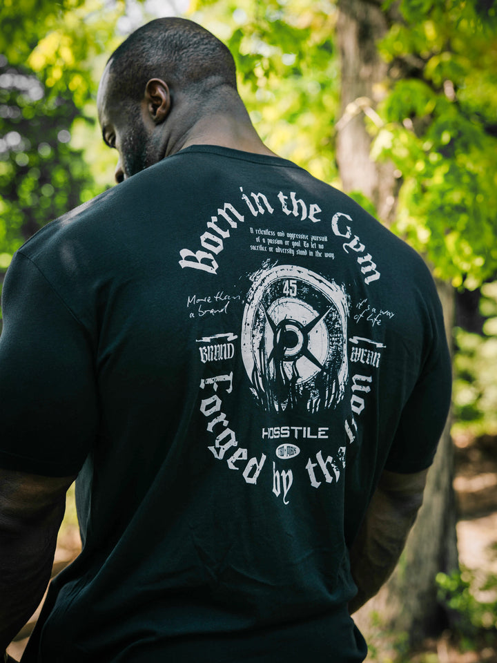 Bodybuilder Samson Dauda wearing the Forged Workout T-Shirt#color_black