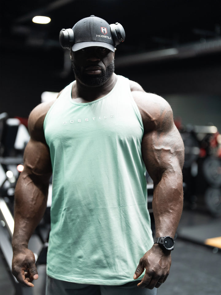 Foundation Men's Workout Tank Top - Cobalt - Model Bodybuilder Samson Dauda#color_pale-green