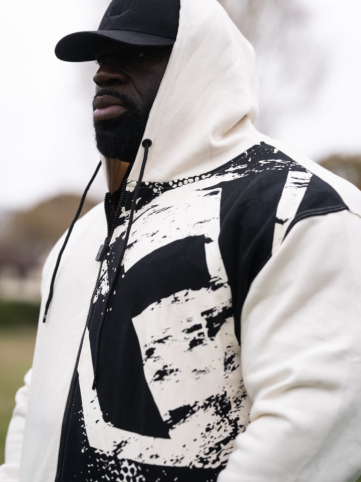 Samson Dauda wearing the Fractured Zip-Up Hoodie#color_off-white