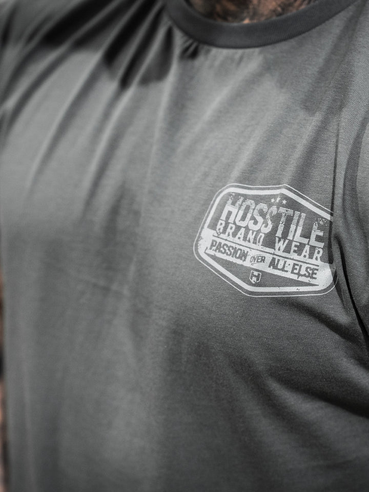 Bodybuilder wearing the Hosstile Garage Tee#color_gunship-grey