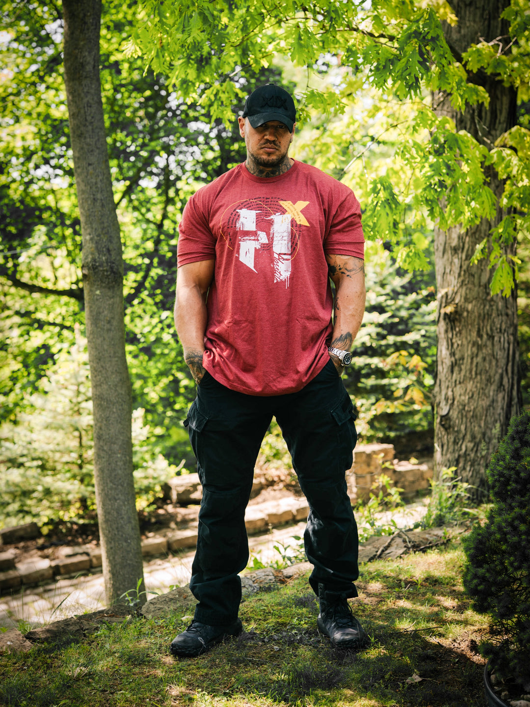 Bodybuilder wearing the Halo Workout Tee#color_cardinal