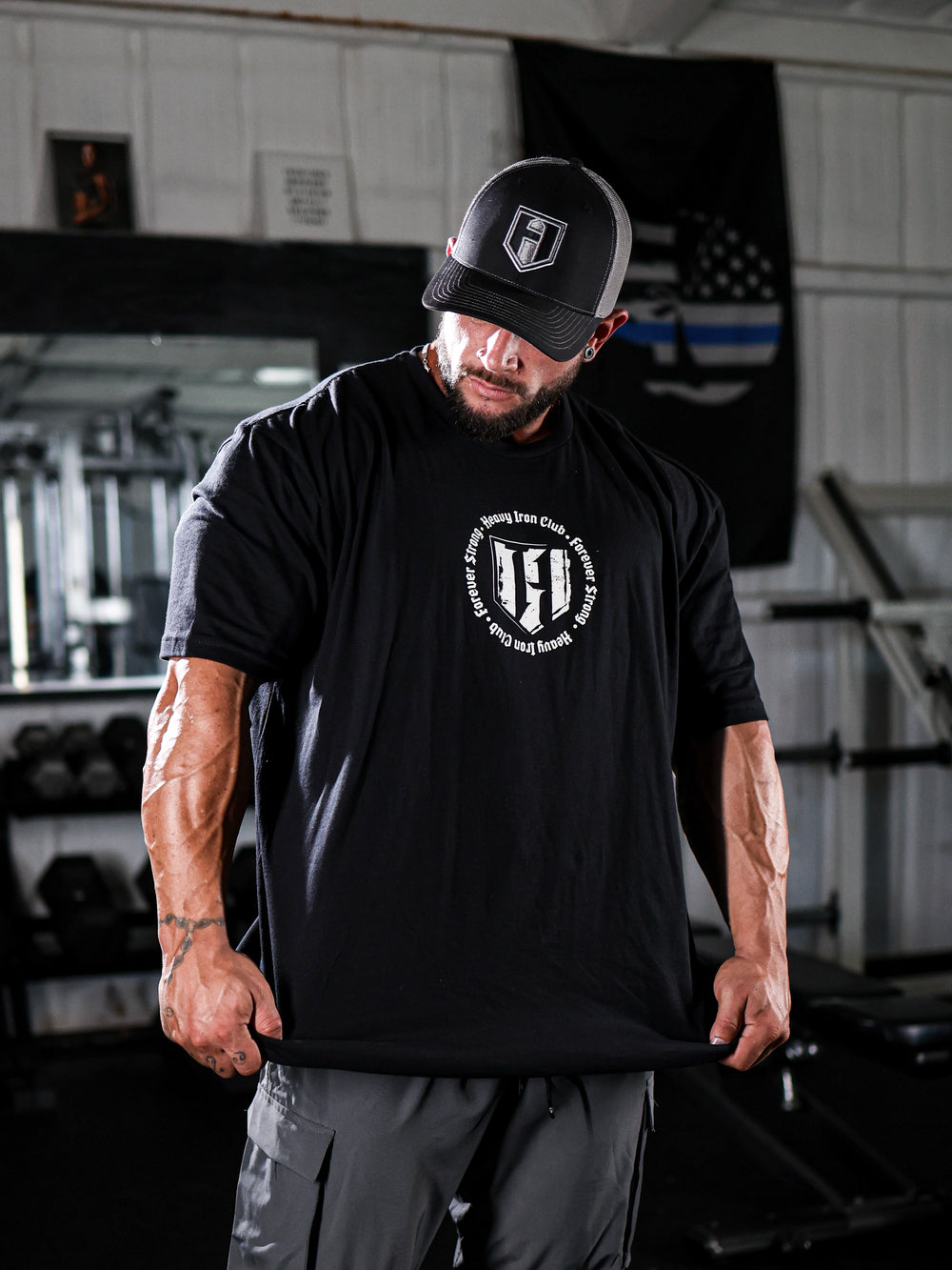 Bodybuilder wearing the Heavy Iron T-Shirt#color_black