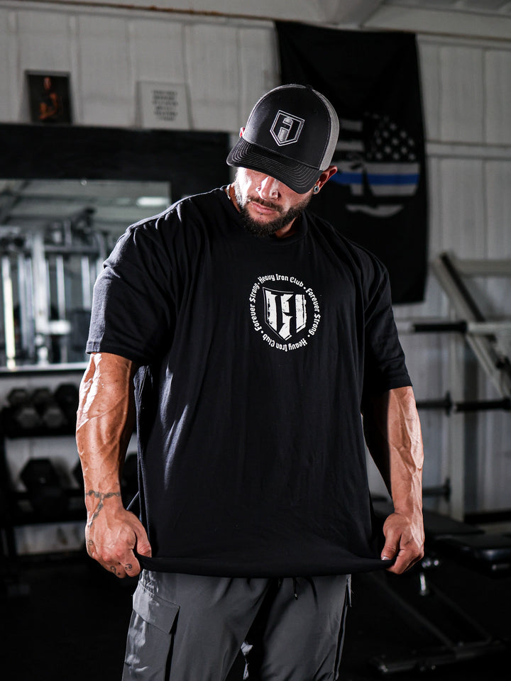 Bodybuilder wearing the Heavy Iron T-Shirt#color_black