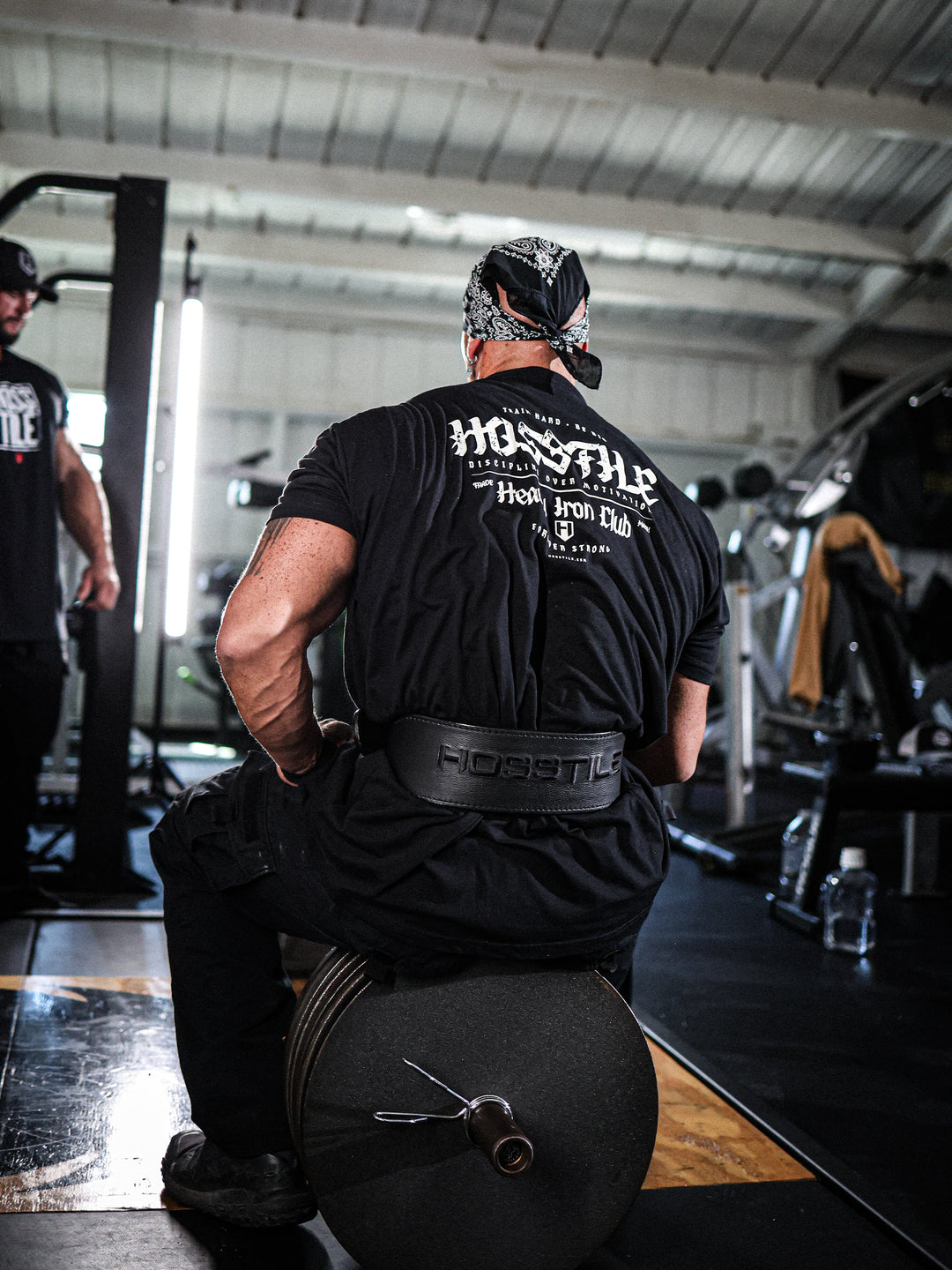 Bodybuilder wearing the Heavy Iron T-Shirt#color_black