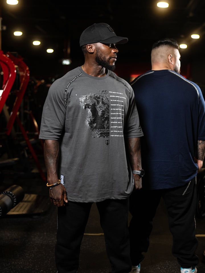 Bodybuilder wearing Samson Dauda King Oversized Tee