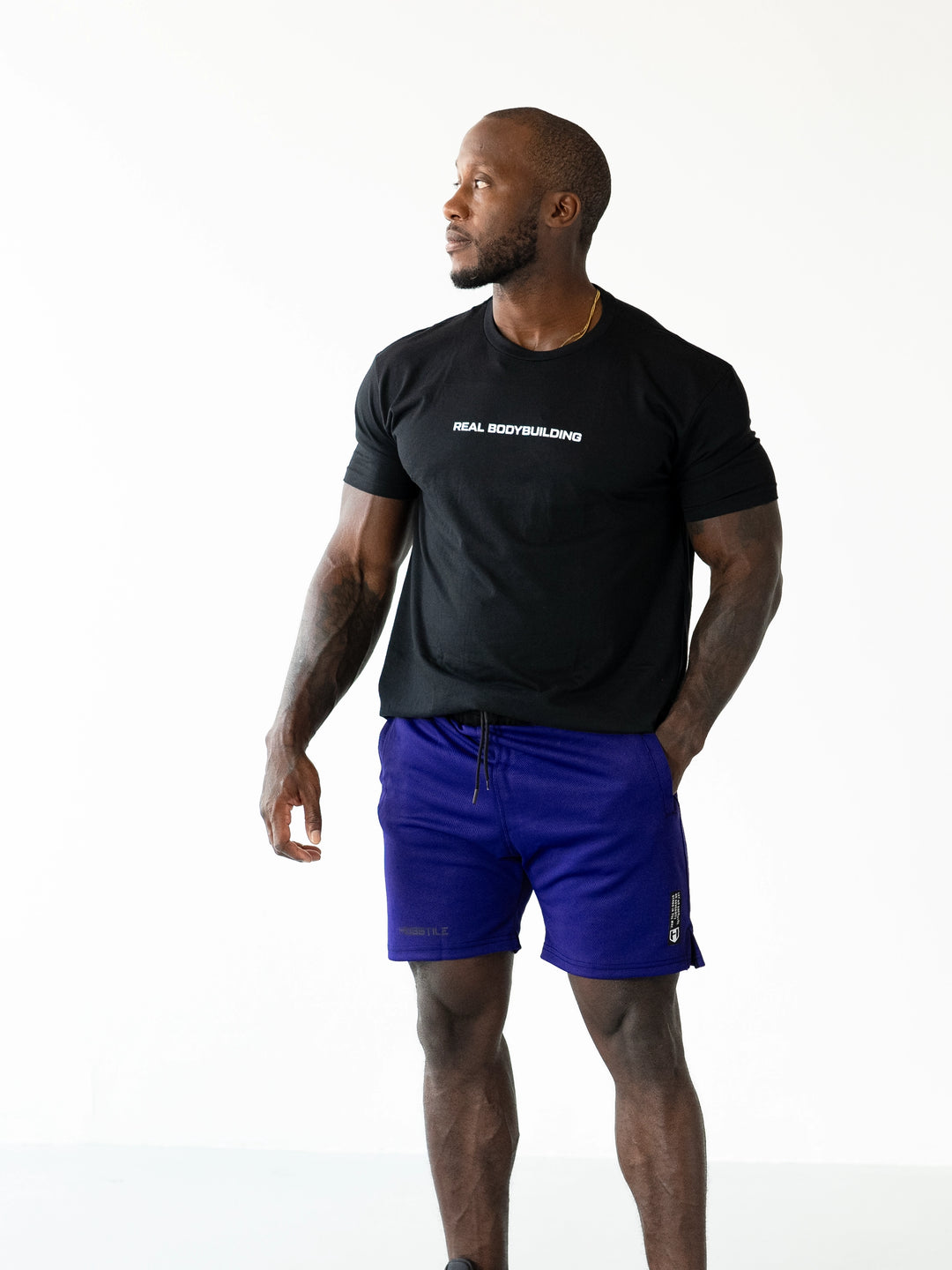 Bodybuilder Wearing Sacrifice Mesh Training Shorts#color_purple