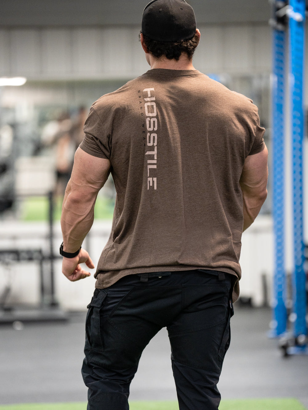 Bodybuilder wearing OG Sacrifice Classic Workout T-Shirt#color_espresso