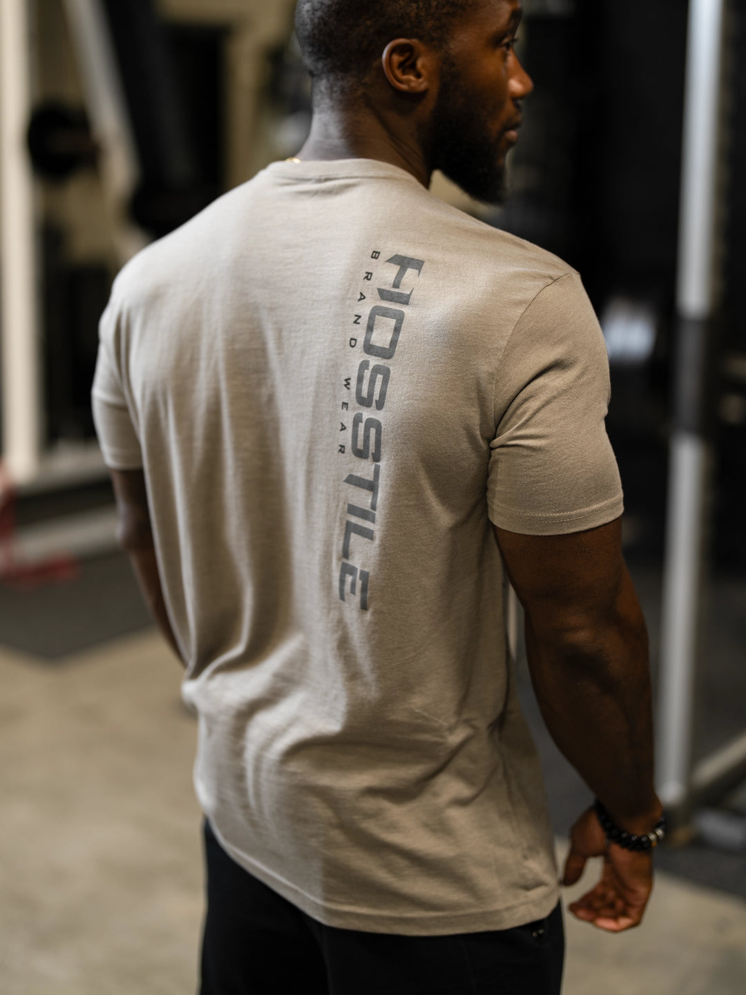 Bodybuilder Fouad Abiad wearing OG Sacrifice Classic Workout T-Shirt#color_stone-grey