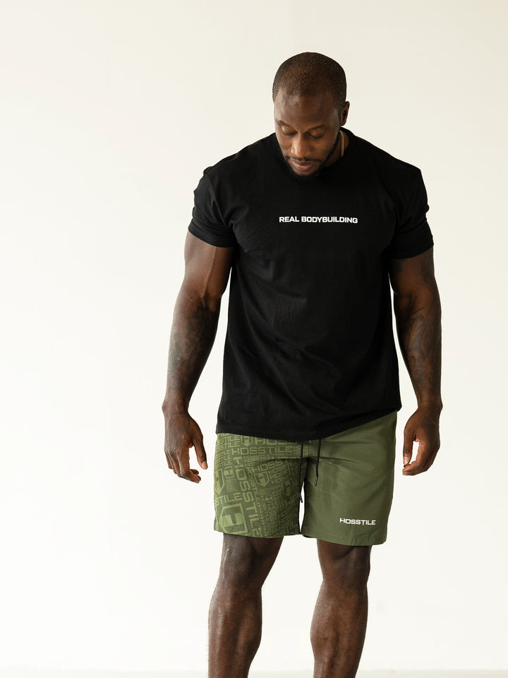 Bodybuilder Wearing Phantom Training Shorts#color_dark-olive