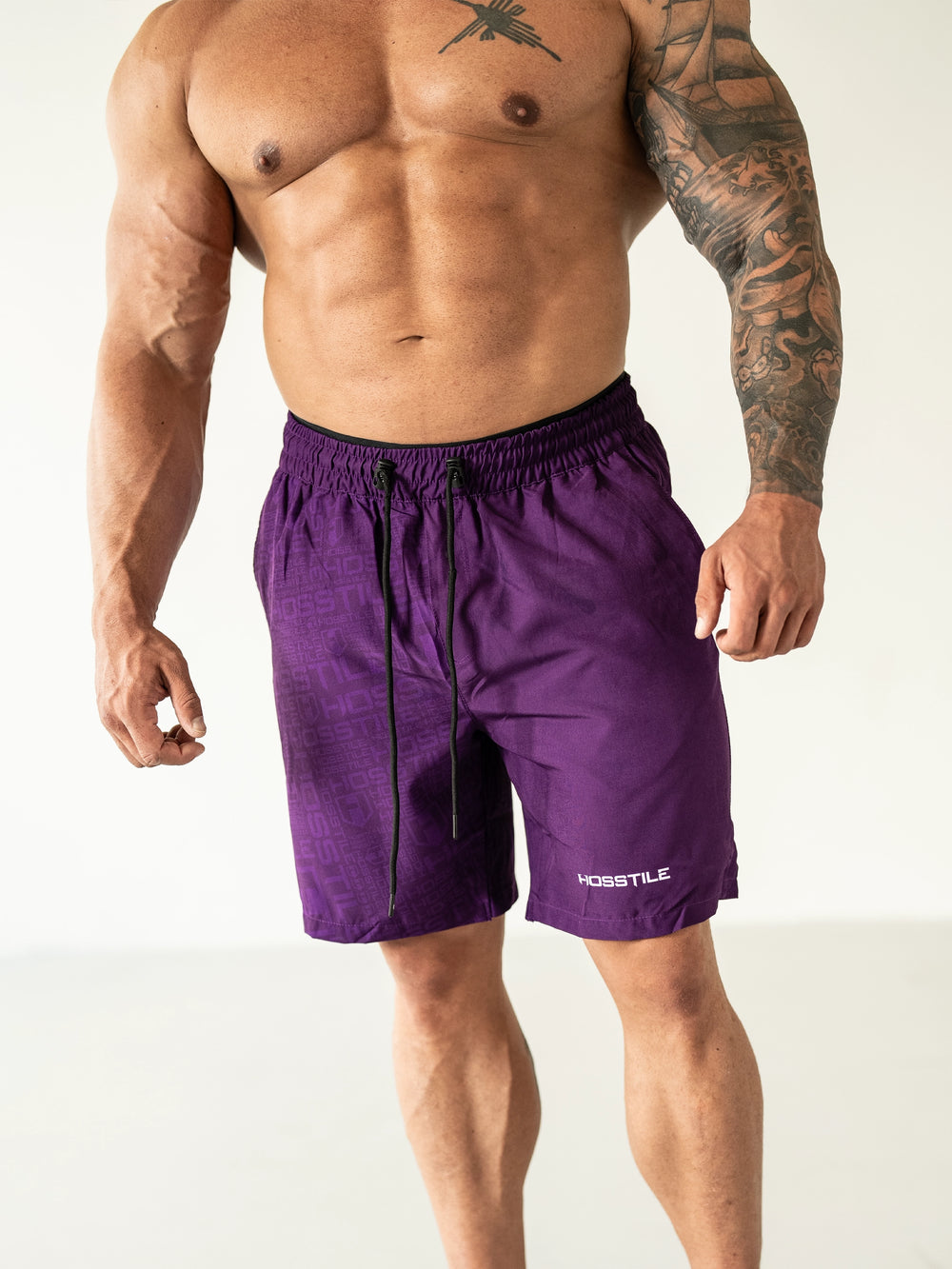 Bodybuilder Wearing Phantom Training Shorts#color_purple