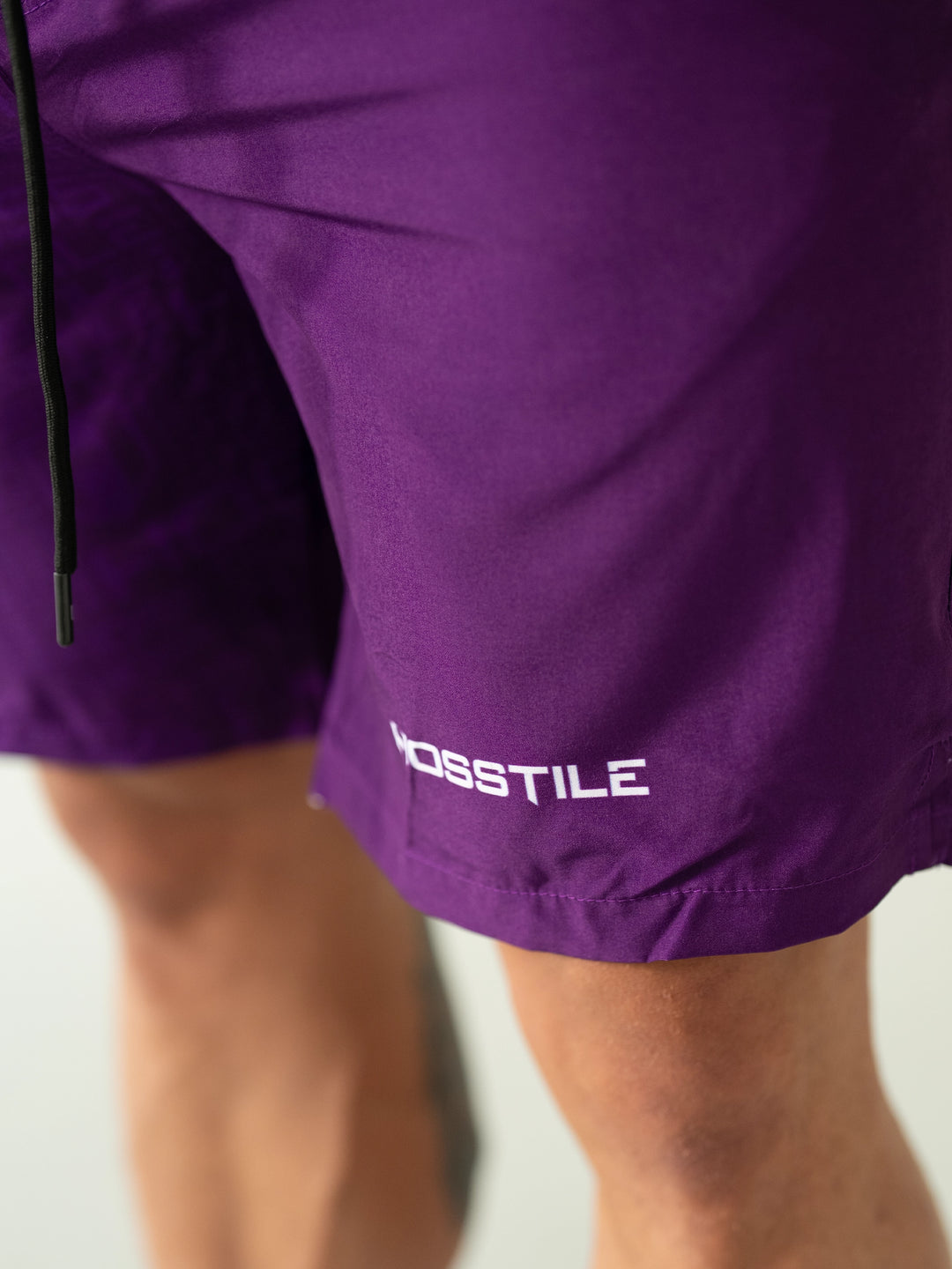 Bodybuilder Wearing Phantom Training Shorts#color_purple