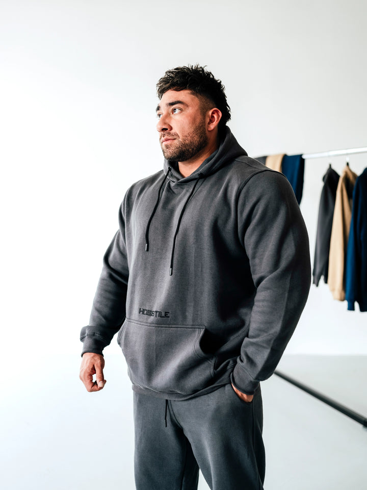 Bodybuilder Wearing Relaxed Gym Hoodie#color_gunship-grey