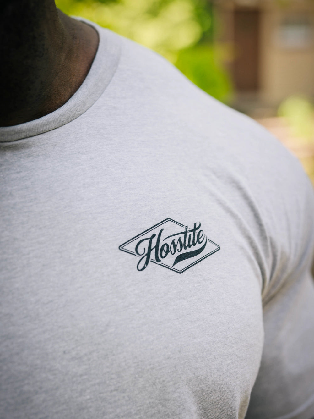 Bodybuilder wearing the Retro Select Workout T-shirt#color_heather-grey