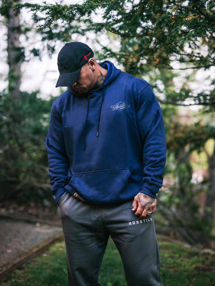 Bodybuilder wearing the Retro Select Workout Hoodie#color_navy
