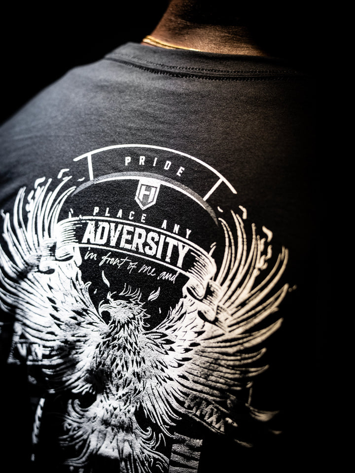 Black t-shirt with white eagle design and text on a dark background#color_black