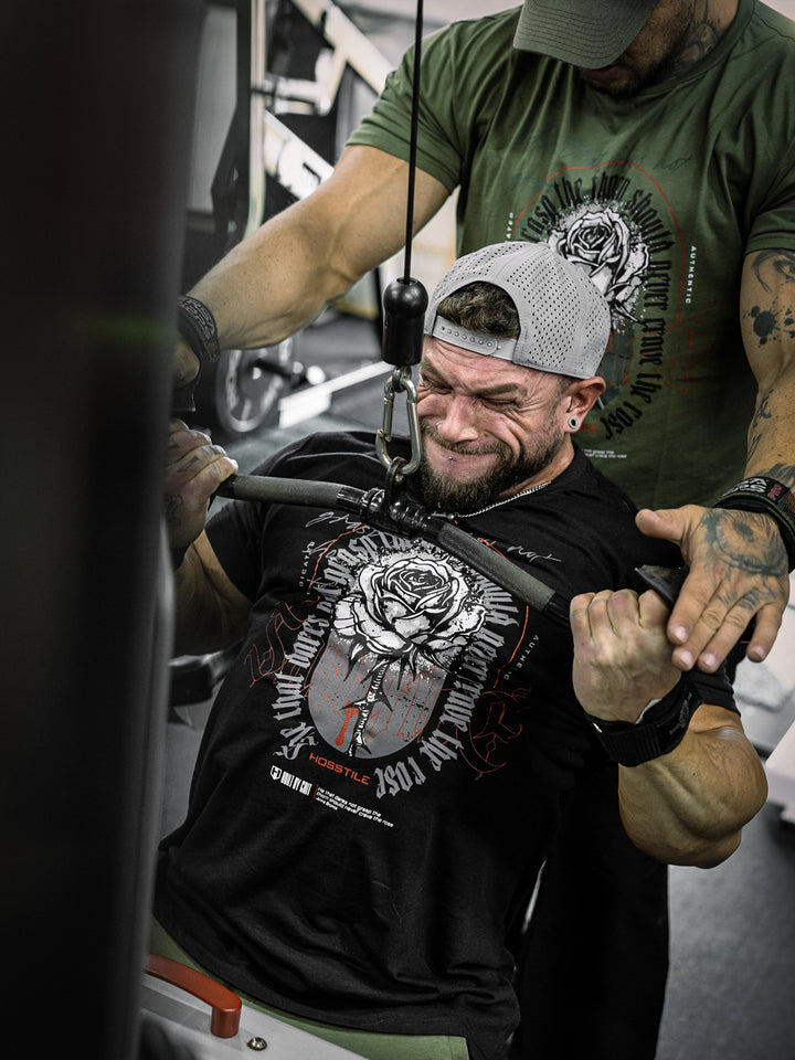 bodybuilder wearing the Rose & Thorn Men's Graphic Gym T-Shirt#color_black