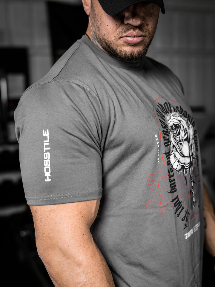 bodybuilder wearing the Rose & Thorn Men's Graphic Gym T-Shirt#color_grey