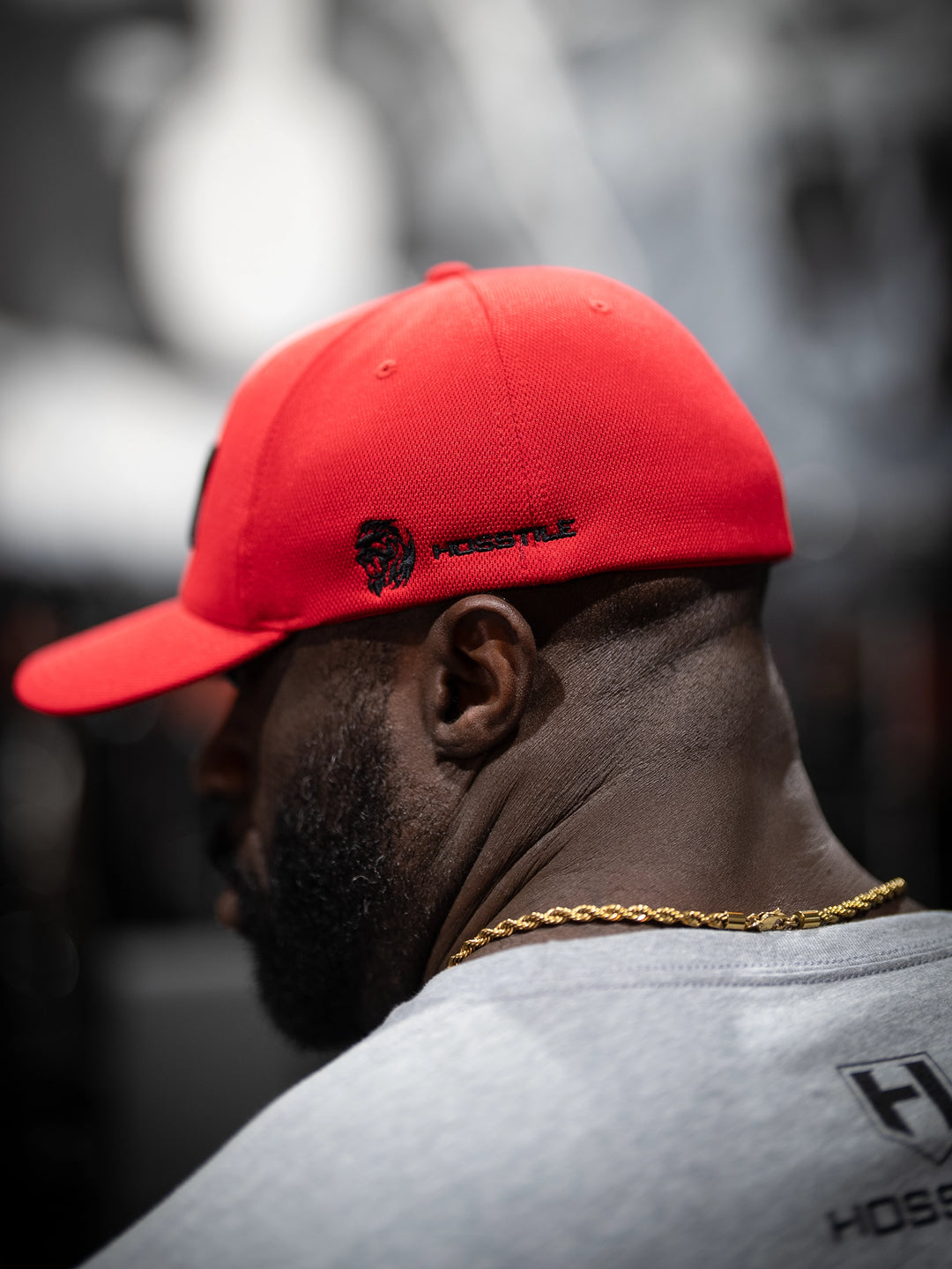 Bodybuilder wearing SD Champion Flexfit hat