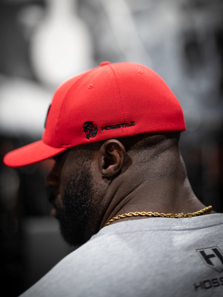 Bodybuilder wearing SD Champion Flexfit hat