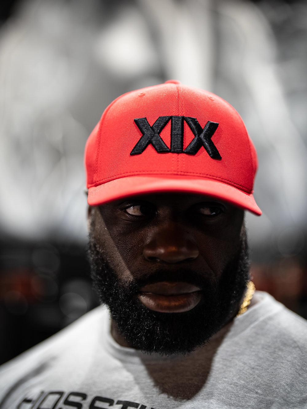 Bodybuilder wearing SD Champion Flexfit hat