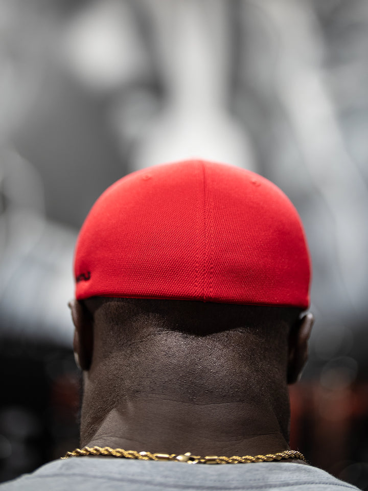 Bodybuilder wearing SD Champion Flexfit hat
