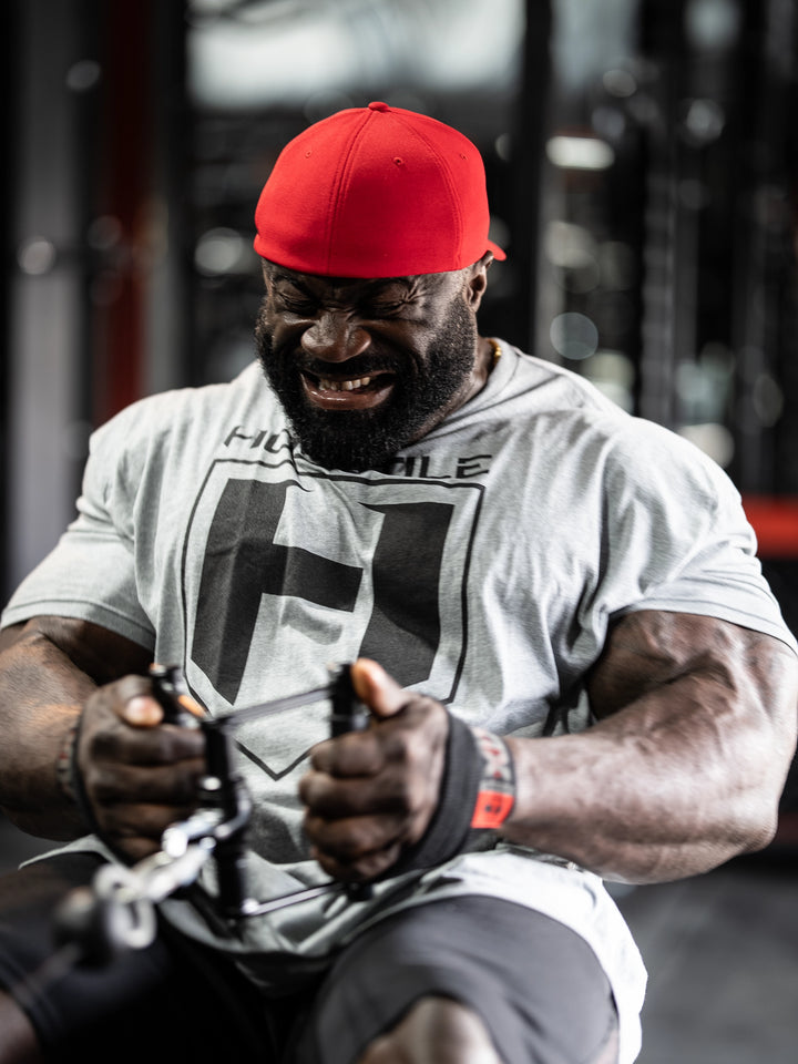 Bodybuilder wearing SD Champion Flexfit hat