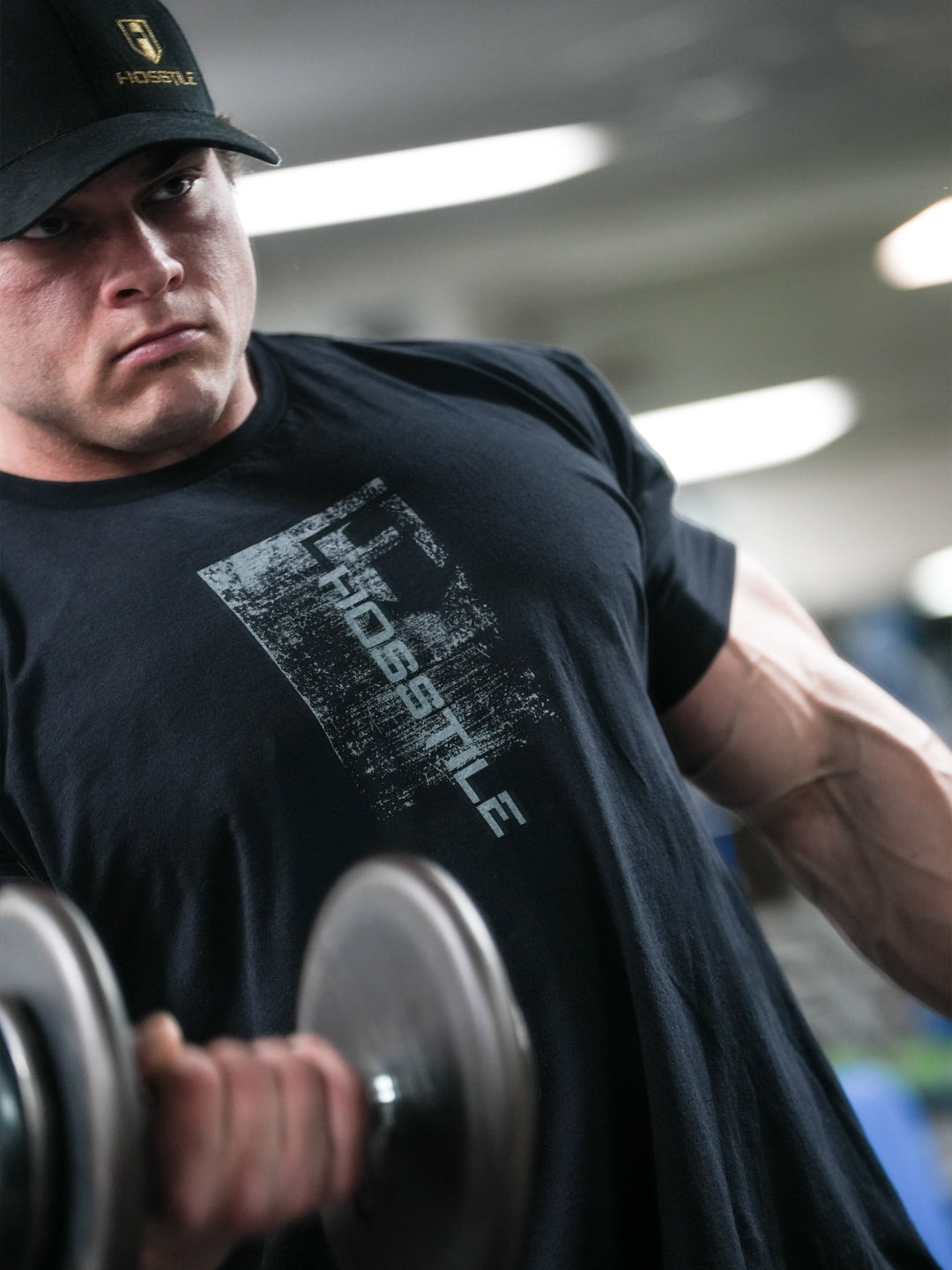 Bodybuilder wearing Sacrifice Long Body T-Shirt#color_black