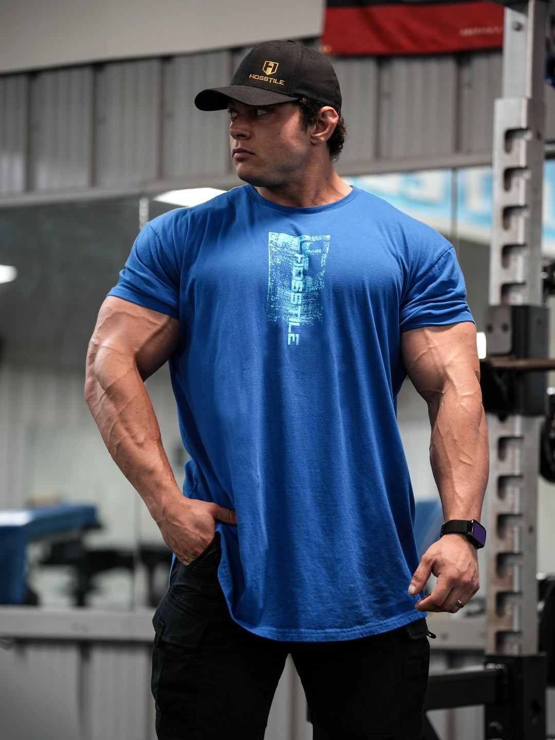 Bodybuilder wearing Sacrifice Long Body T-Shirt#color_royal-blue