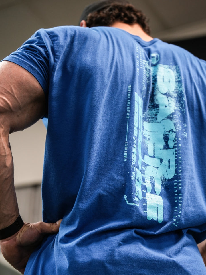 Bodybuilder wearing Sacrifice Long Body T-Shirt#color_royal-blue