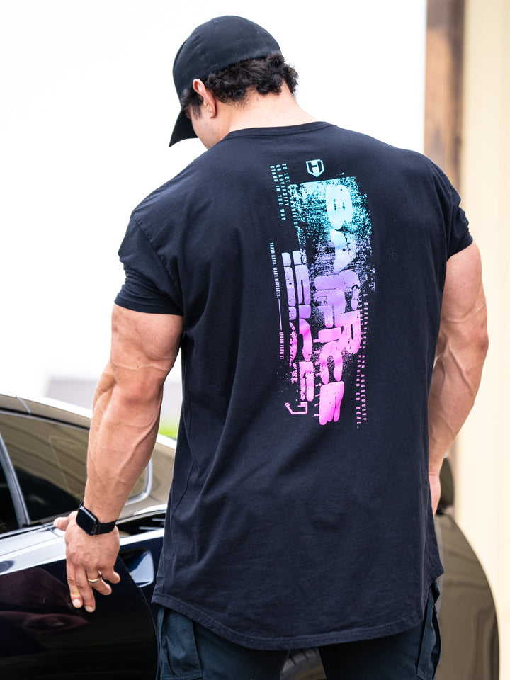 Bodybuilder wearing Sacrifice Long Body T-Shirt#color_miami-vice