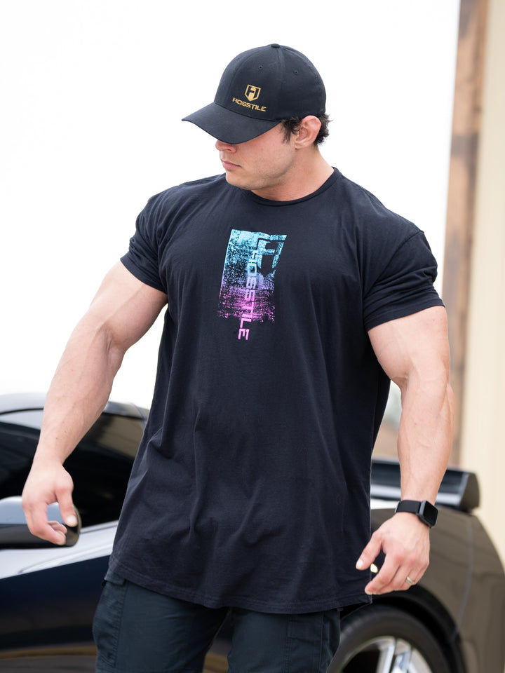 Bodybuilder wearing Sacrifice Long Body T-Shirt#color_miami-vice