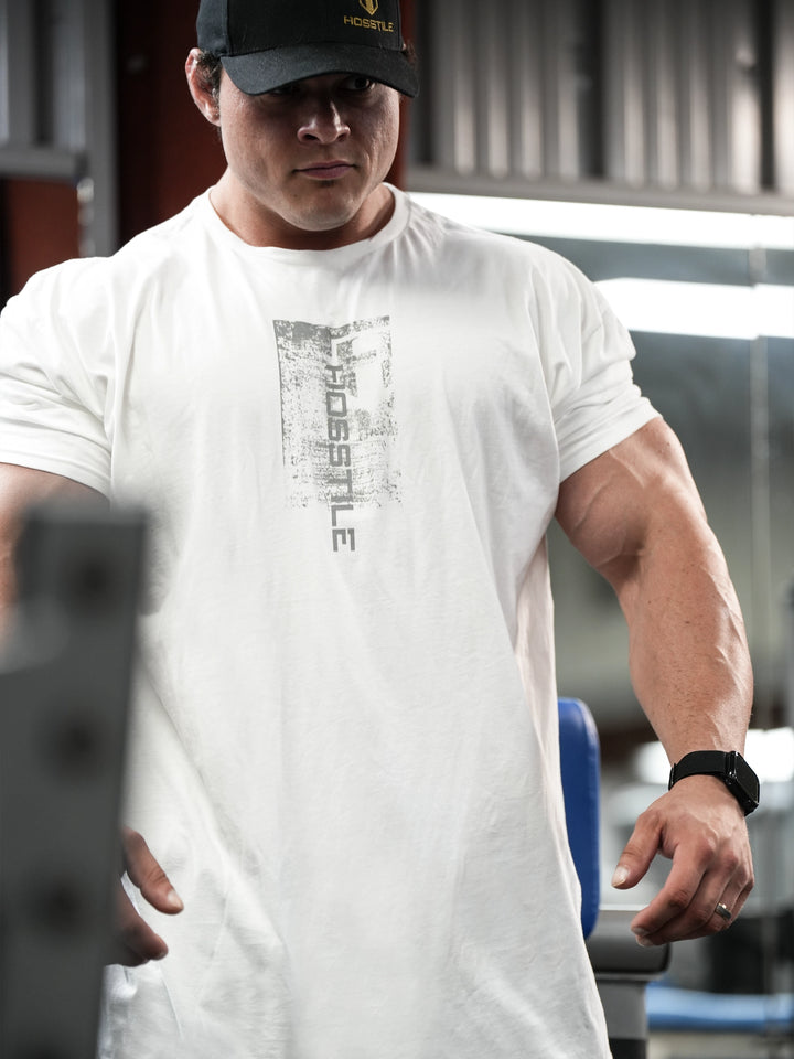 Bodybuilder wearing Sacrifice Long Body T-Shirt#color_white