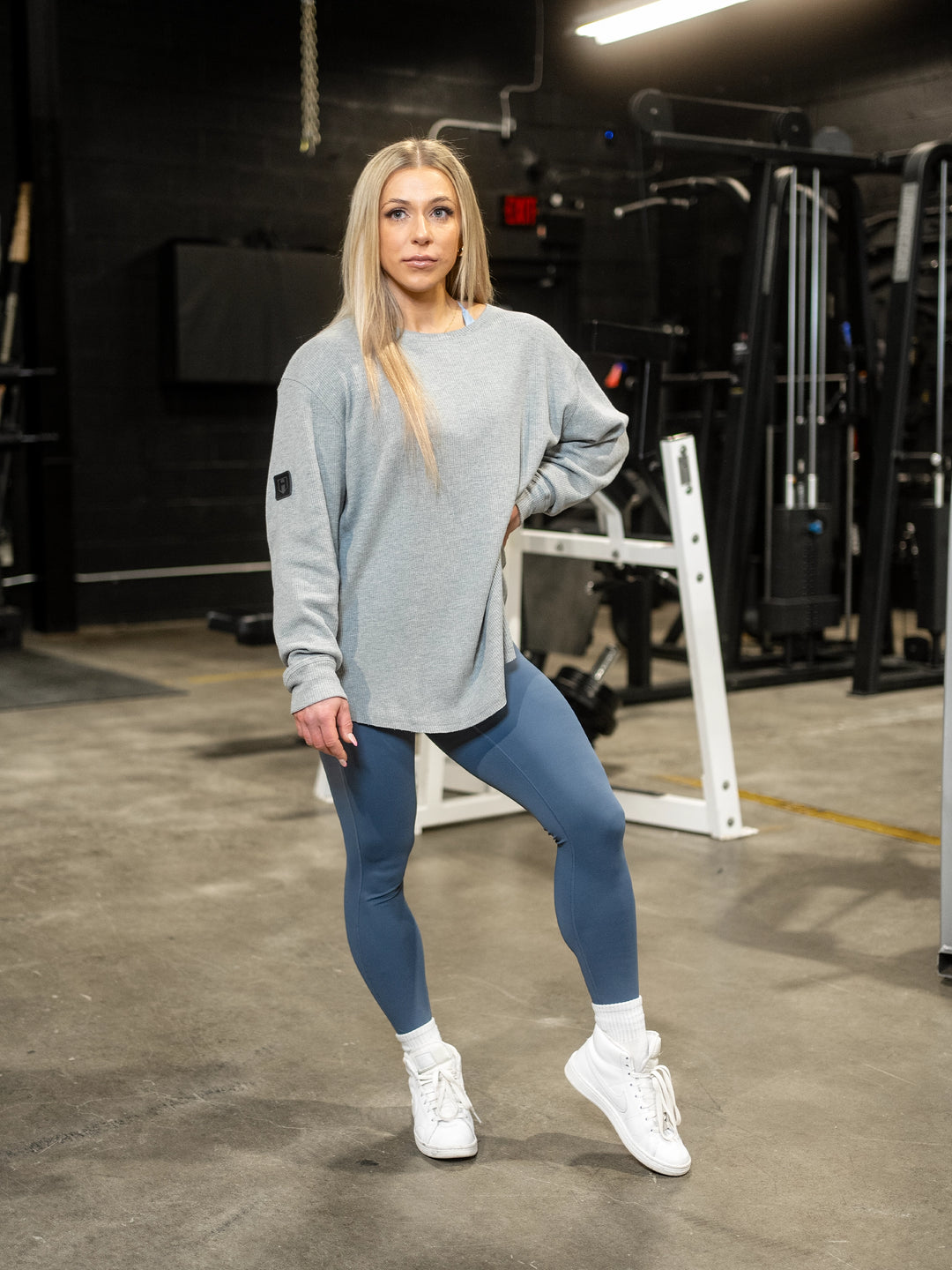 Fitness model wearing Shield Thermal Shirt#color_athletic-heather-grey