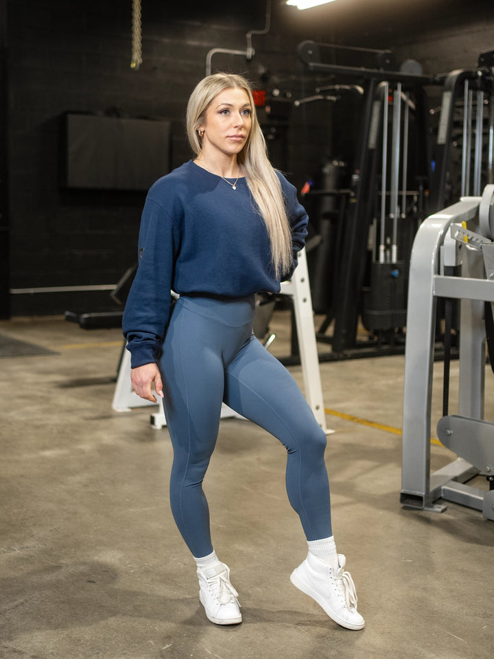 Fitness model wearing Shield Thermal Shirt#color_steel-blue