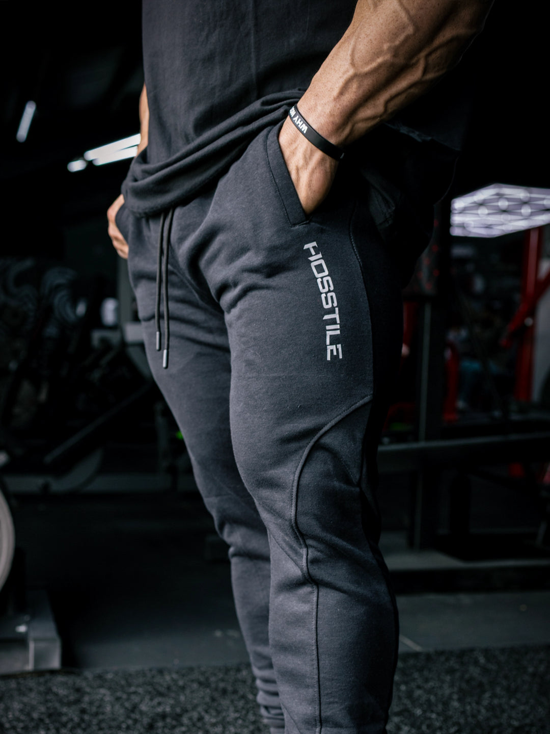 Martin Fitzwater wearing joggers in the gym#color_black