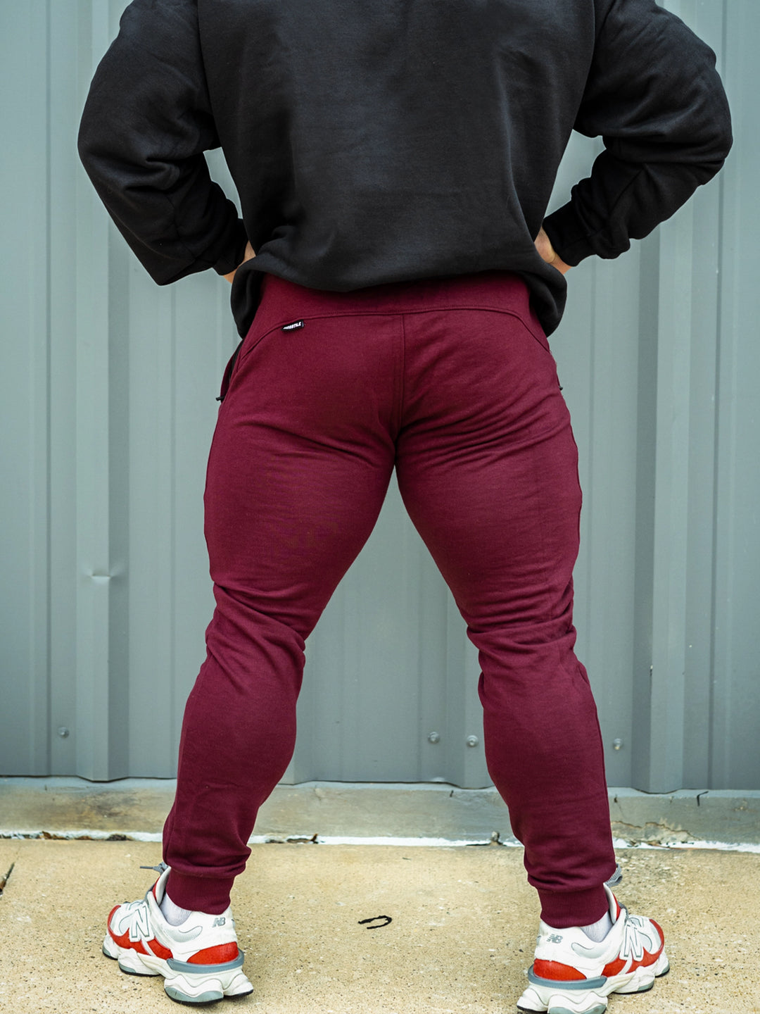 Martin Fitzwater wearing joggers in the gym#color_deep-cherry