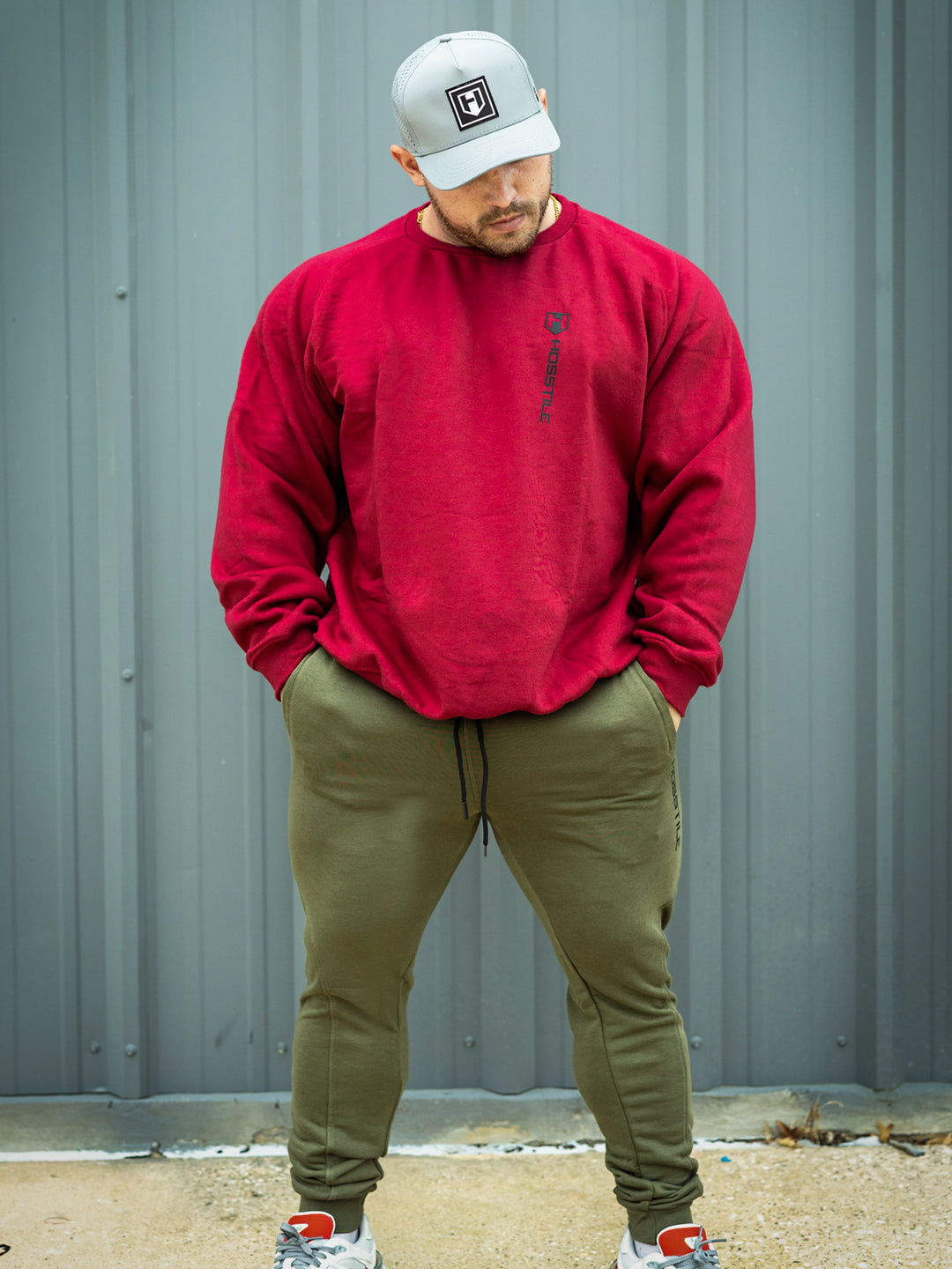 Martin Fitzwater wearing joggers in the gym#color_military-green