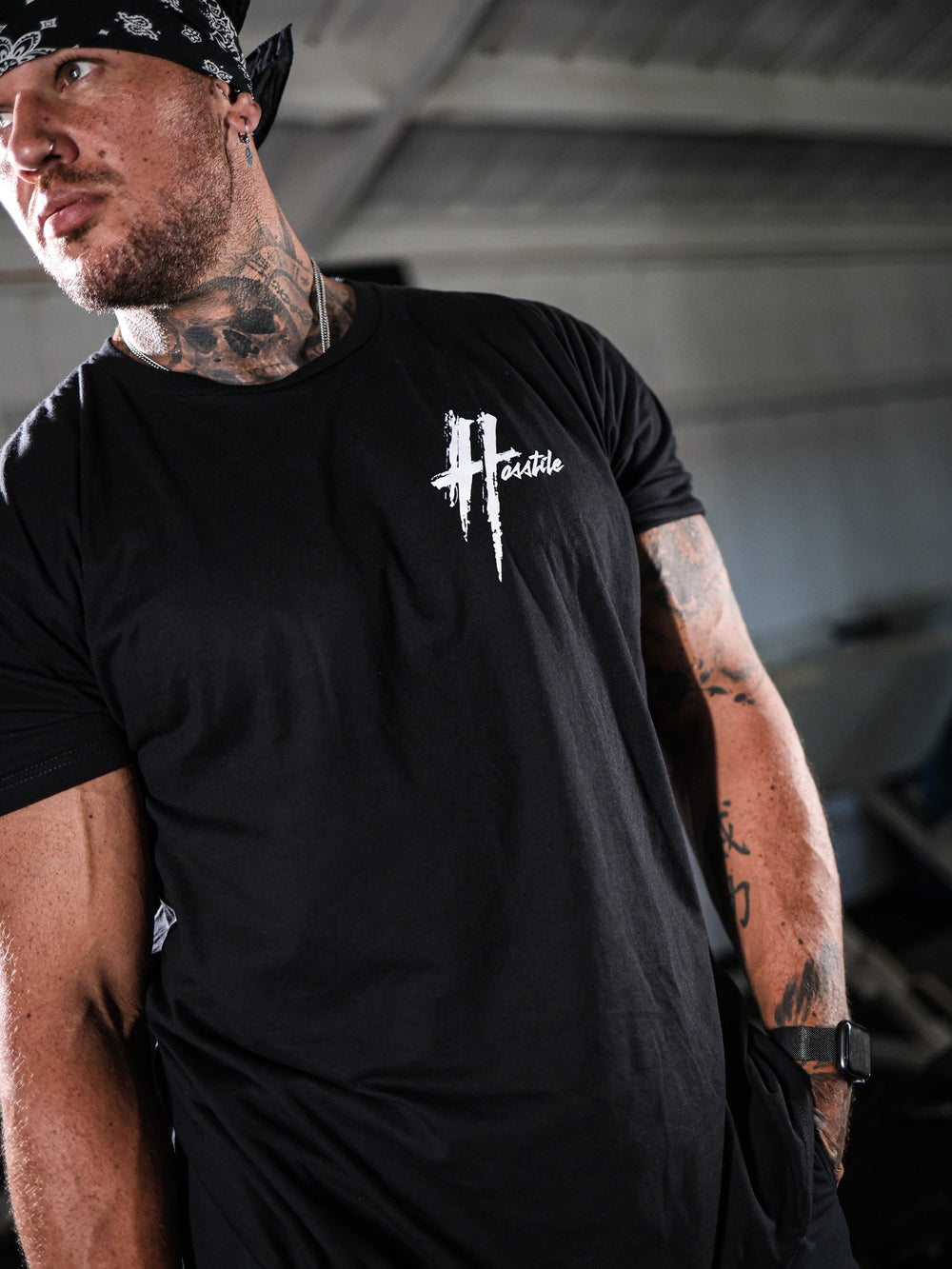 Bodybuilding wearing The Big H Tee in the gym#color_black