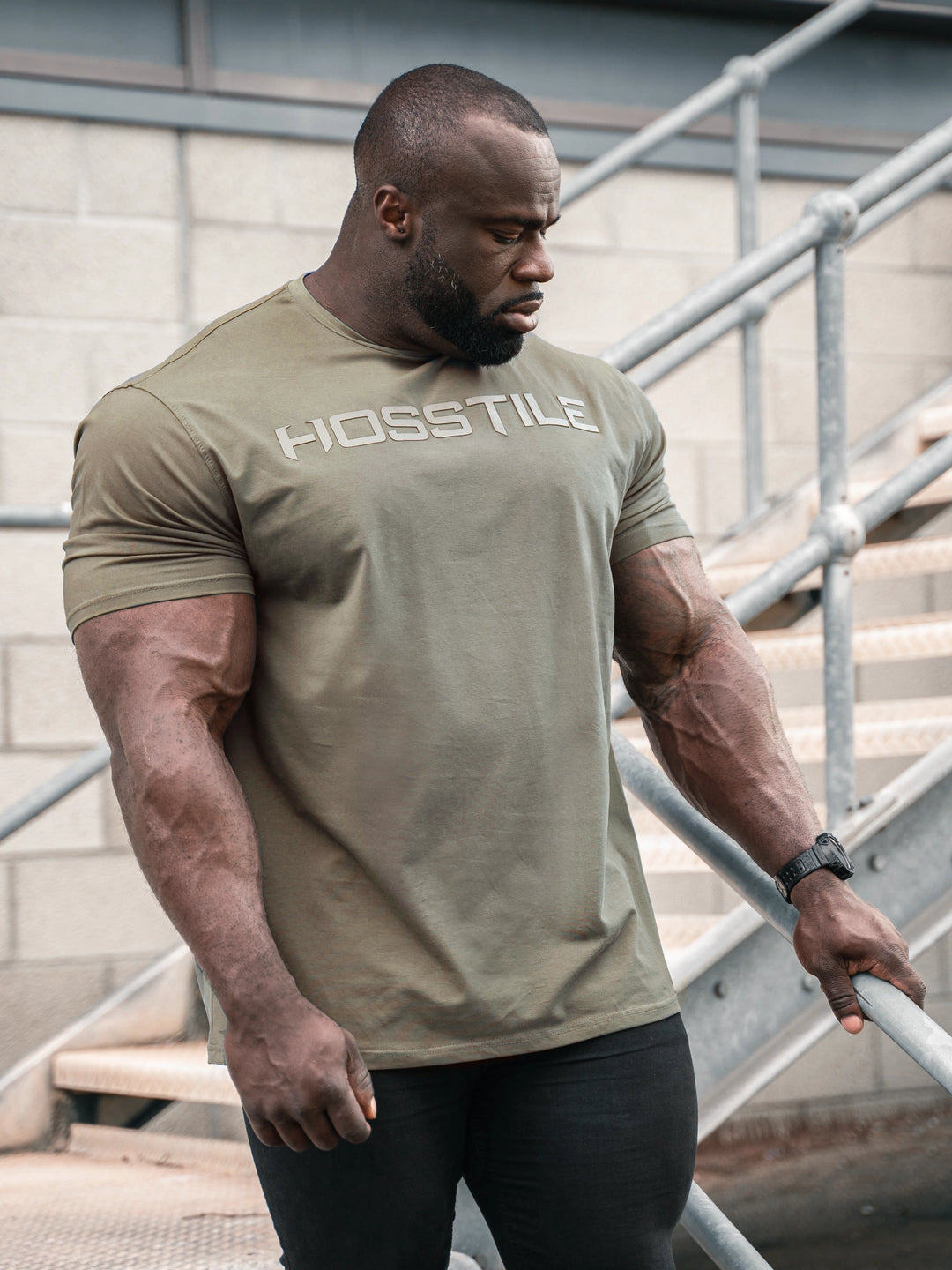 Uplift Men's Workout T-Shirt - Gunship Grey - Model Bodybuilder Samson Dauda#color_military-green