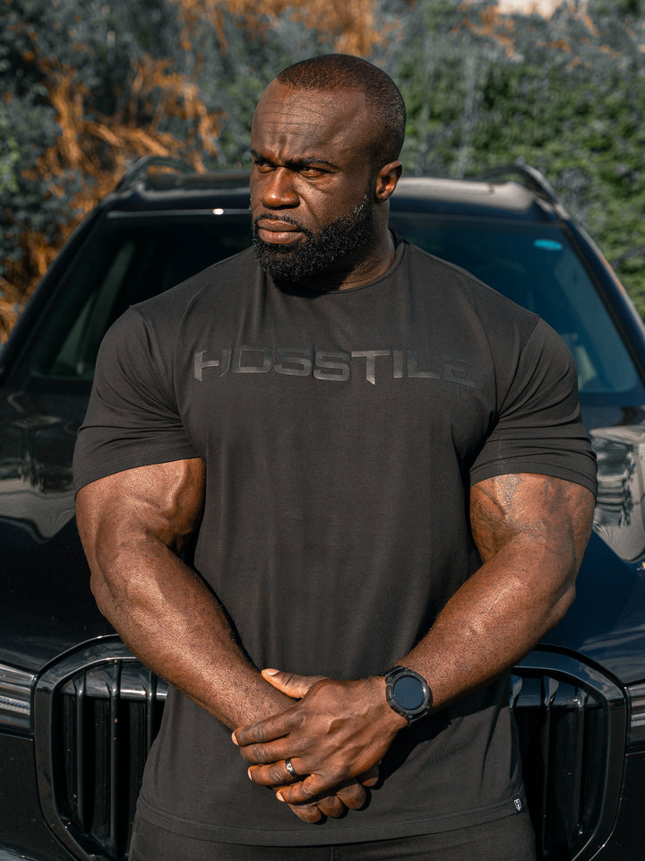 Uplift Men's Workout T-Shirt - Black - Model Bodybuilder Samson Dauda#color_black