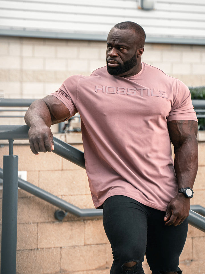 Uplift Men's Workout T-Shirt - Maui Mauve - Model Bodybuilder Samson Dauda#color_maui-mauve