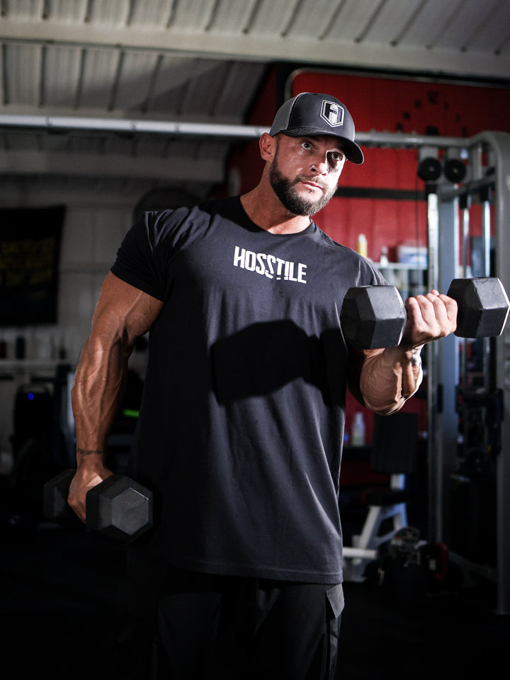 Bodybuilder wearing the Victory Tee Workout T-Shirt#color_black