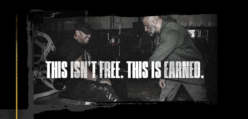 Two bodybuilders in a dark gym setting with text overlay 'THIS ISN'T FREE. THIS IS EARNED.'