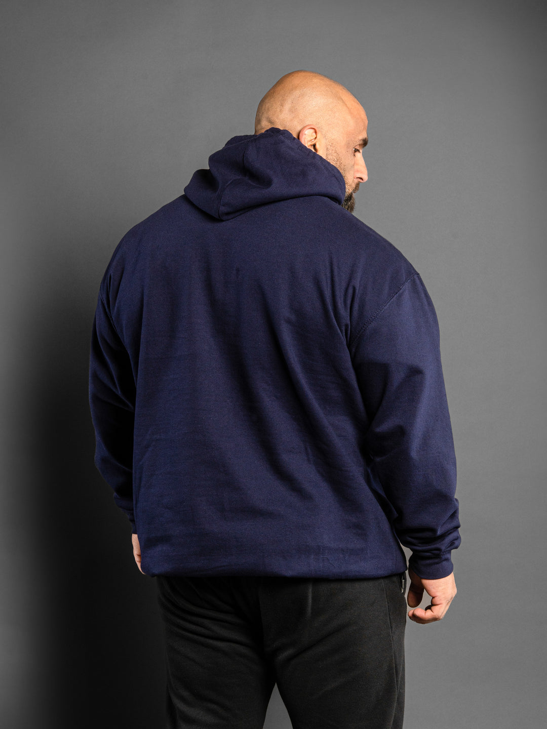 Hosstile College Pullover Hoodie Sweatshirt Navy Model Bodybuilder Fouad Abiad#color_navy