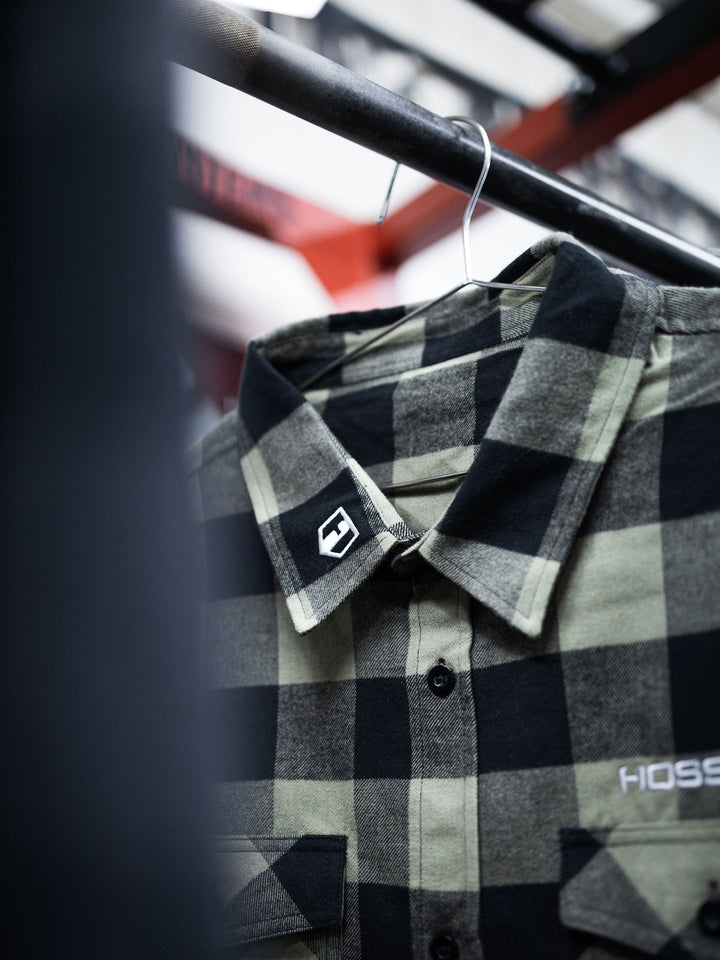 Hosstile Shield Long Sleeve Plaid Flannel Button Down Shirt Model Ben Chow#color_olive-black