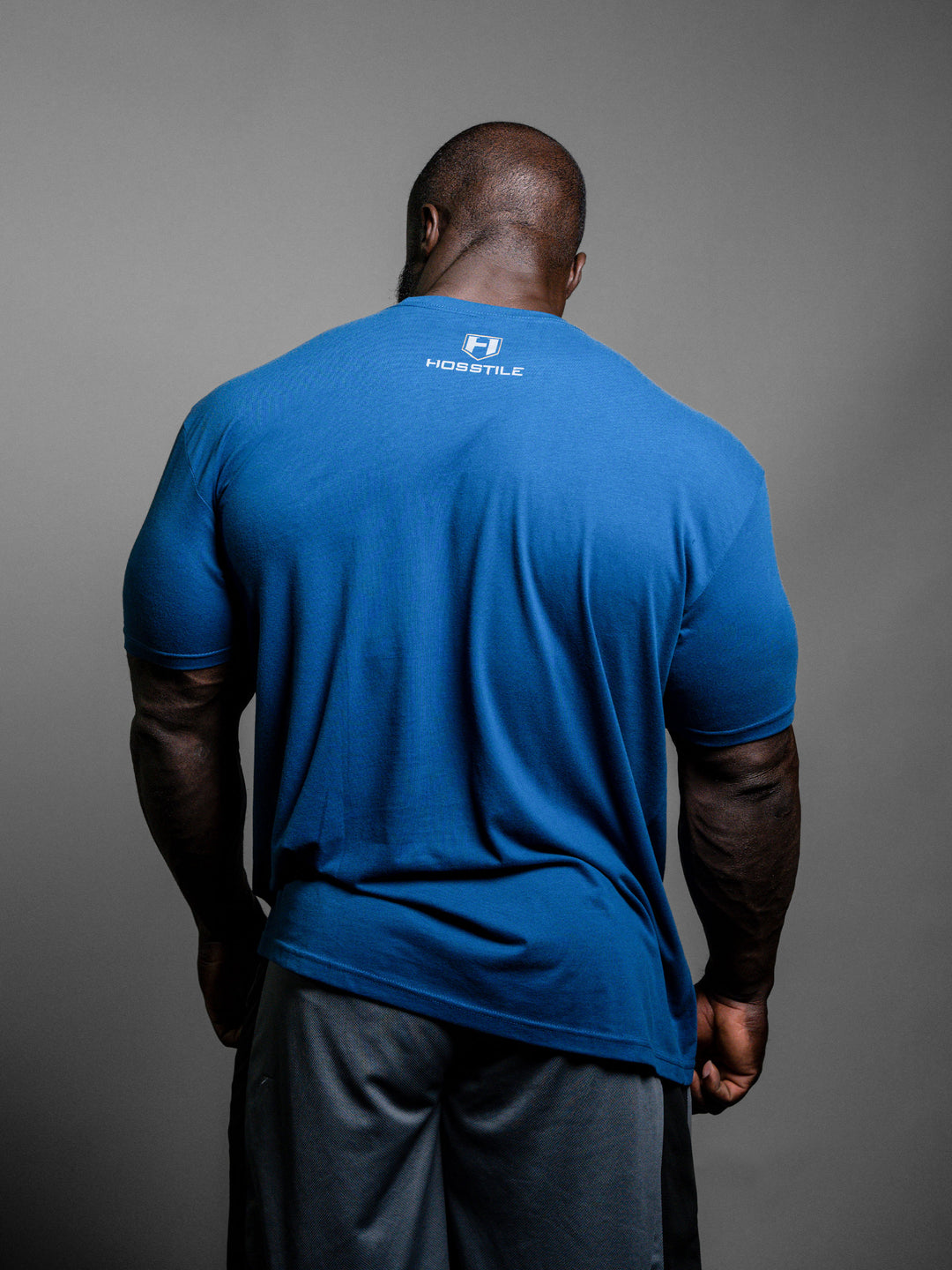 Hosstile Shield T-Shirt Cool Blue - Model Bodybuilder Samson Dauda#color_cool-blue
